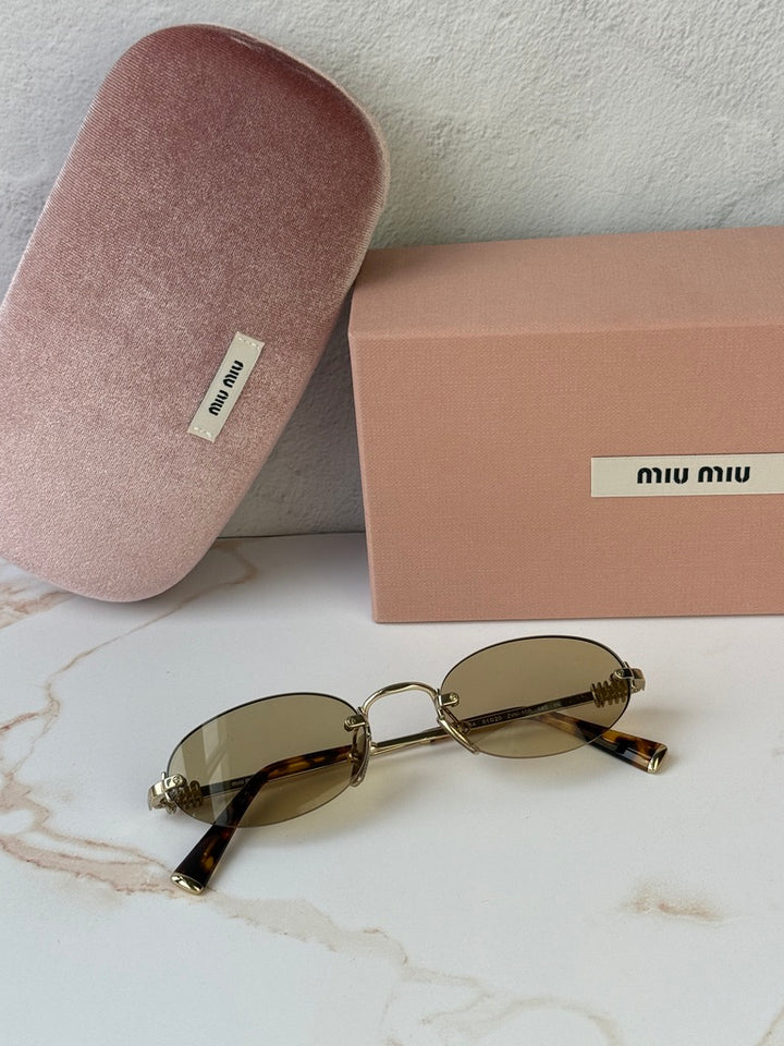 Miu Miu MU A54S Gold Yellow Oval Rimless Sunglasses