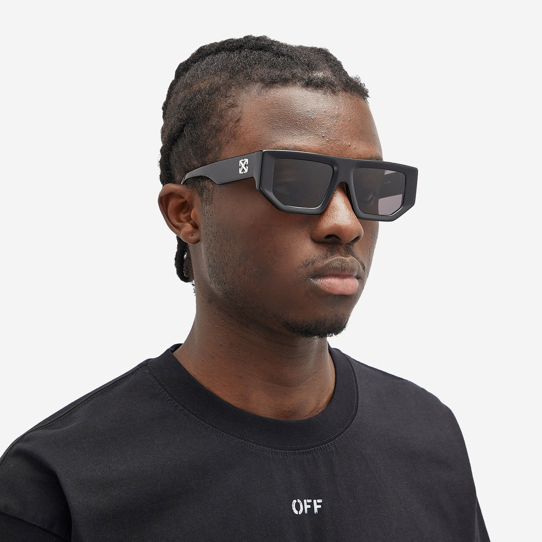 Off-White black square sunglasses on model, dark lenses
