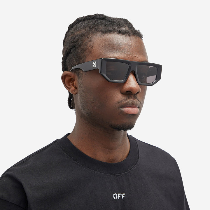 Off-White black square sunglasses on model, dark lenses