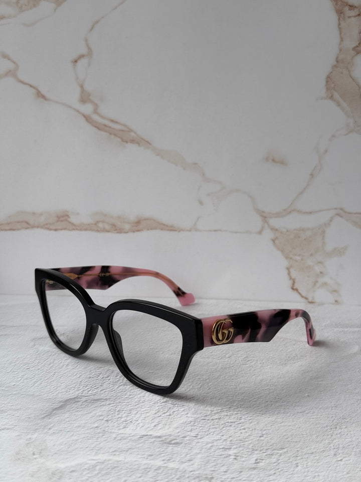 Monturas estilo ojo de gato Gucci GG1424O en negro 
