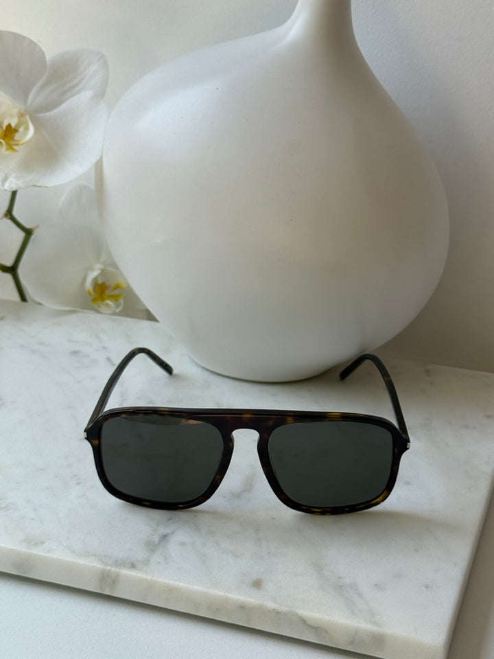 Aviator sunglasses with black-tinted lenses and havana brown frame, front shot