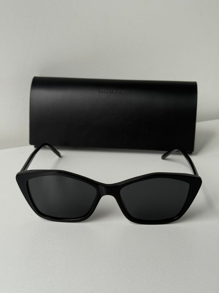 Black cat-eye sunglasses with dark lenses with protective case