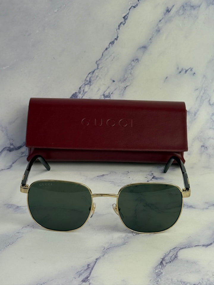 Gucci GG1799S Metal Sunglasses in Gold Grey