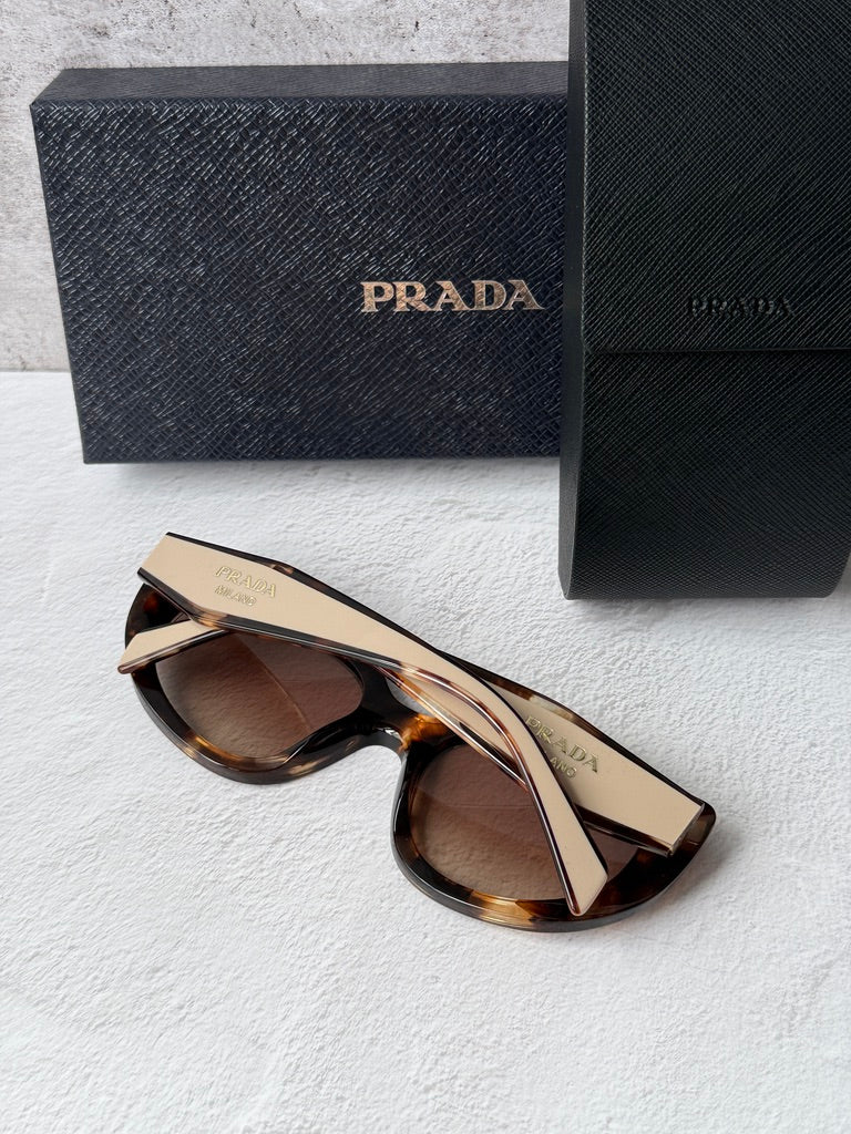 Prada cat-eye sunglasses, Havana powder frame with gold-toned temple