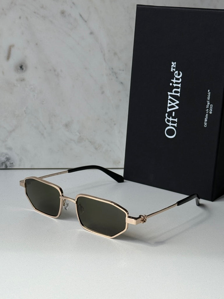 Off-White loa sunglasses, front view, gold metal with dark green lenses.