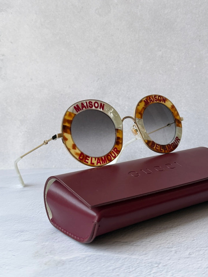 Gucci GG0113S Blind For Love Gafas de sol redondas negras