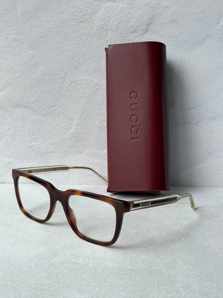 Monturas de anteojos rectangulares atrevidas Gucci GG0560O en negro
