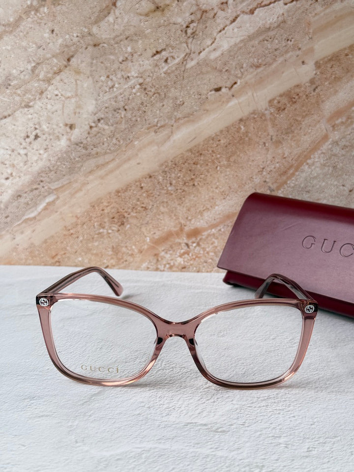 Monturas de anteojos estilo ojo de gato cuadrados desnudos Gucci GG0026O