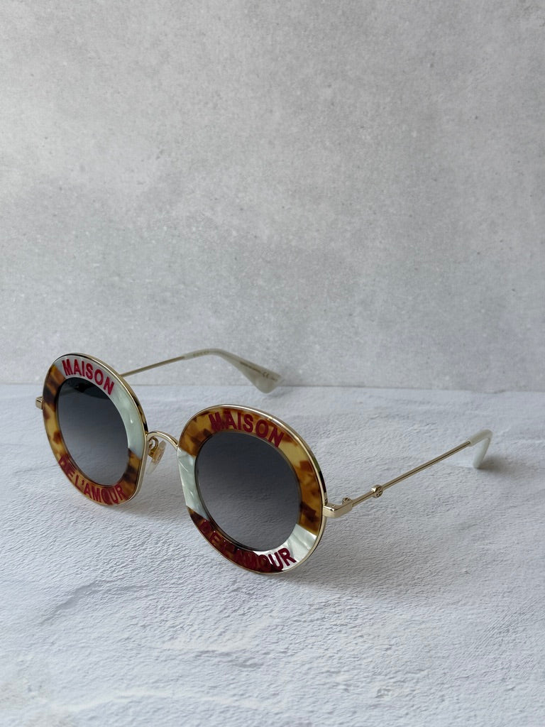 Gucci GG0113S Blind For Love Gafas de sol redondas negras
