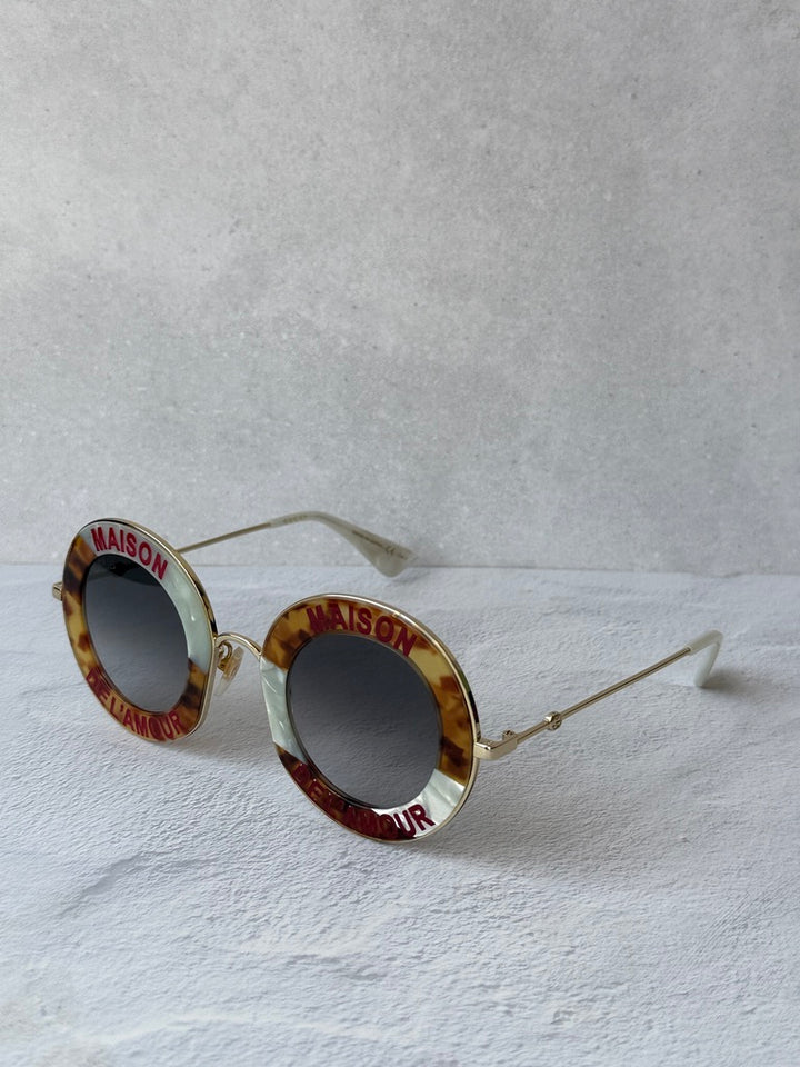 Gucci GG0113S Blind For Love Gafas de sol redondas negras