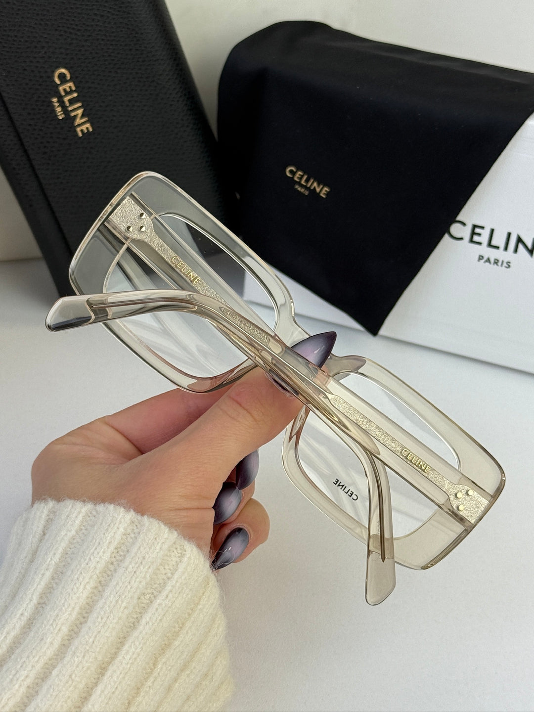 Celine rectangular eyeglass frames, translucent clear with gold-tone temples and hinges