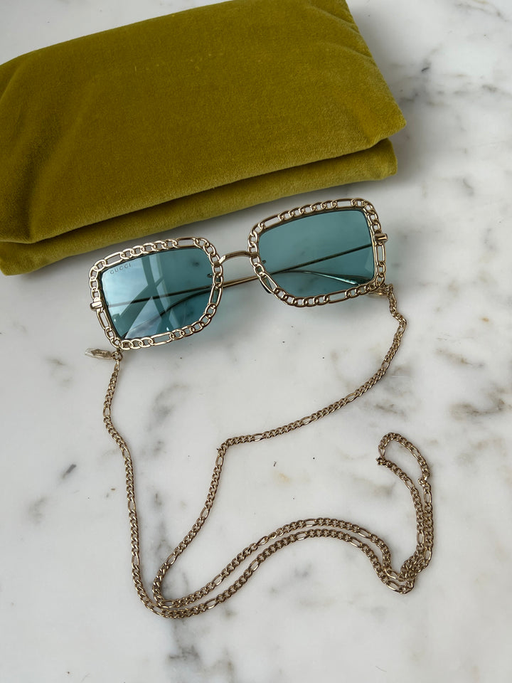 Gucci GG1112S Collar de cadena Gafas de sol rectangulares 