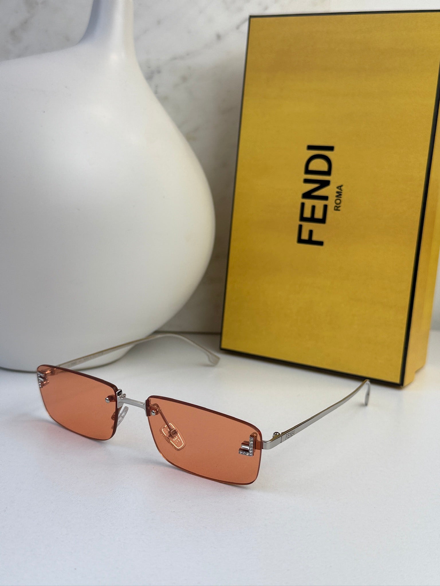 Fendi First FE4172US Rimless Sunglasses in Orange | Designer Daydream