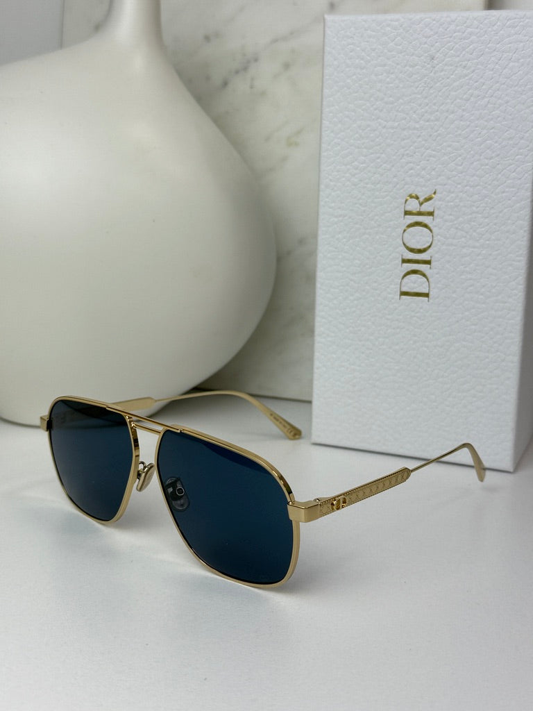 Gold-tone aviator sunglasses with dark blue lenses and slim metal frame