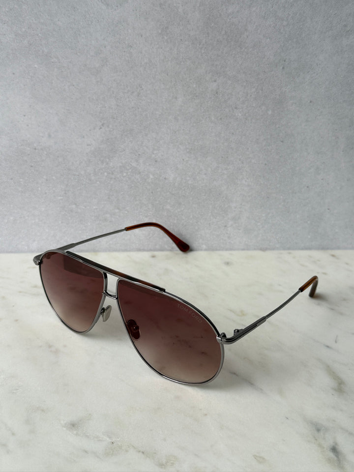 Ruthenium brown aviator sunglasses with burgundy tinted lenses, angled view