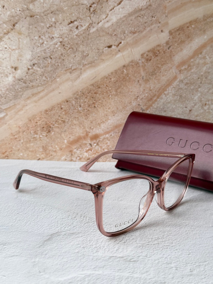 Monturas de anteojos estilo ojo de gato cuadrados desnudos Gucci GG0026O