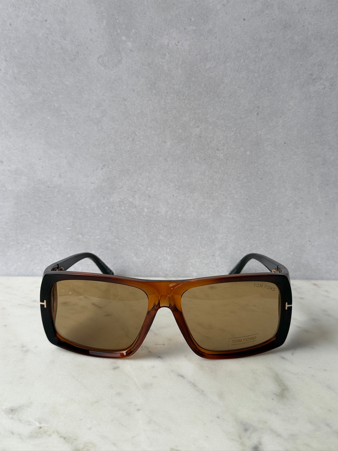 Front view of brown tortoise sunglasses with amber square lenses