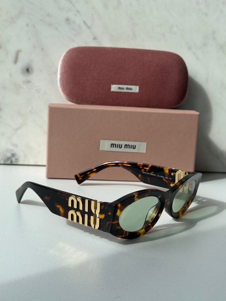 Miu Miu MU11WS Honey Havana Oval Sunglasses