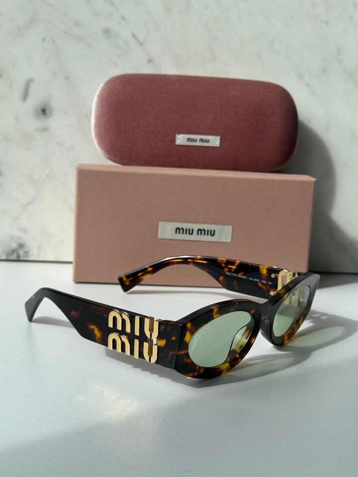 Miu Miu MU11WS Honey Havana Oval Sunglasses