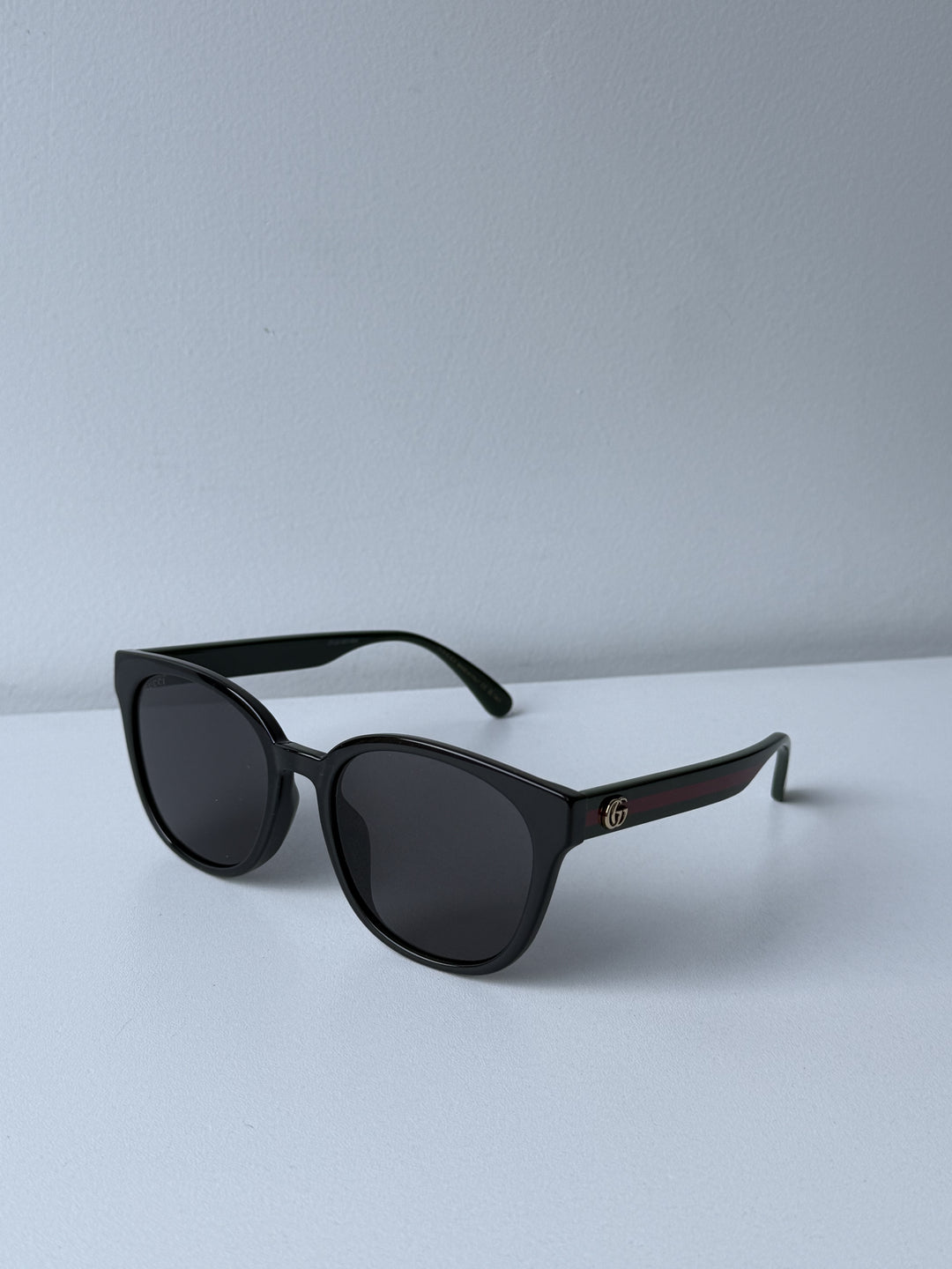 Gucci GG0417SK Black Striped Leg Sunglasses