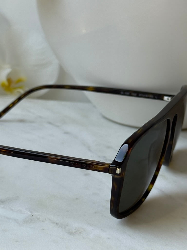 Aviator sunglasses side view: havana brown temple and dark lens