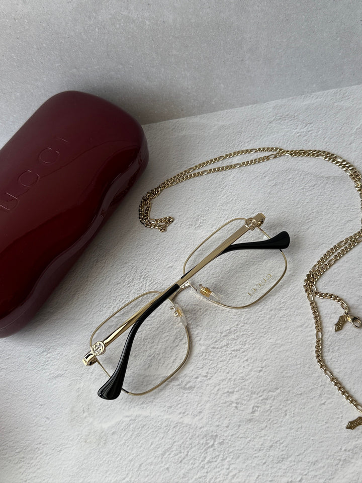 Gucci GG0973O Marcos de metal plateado