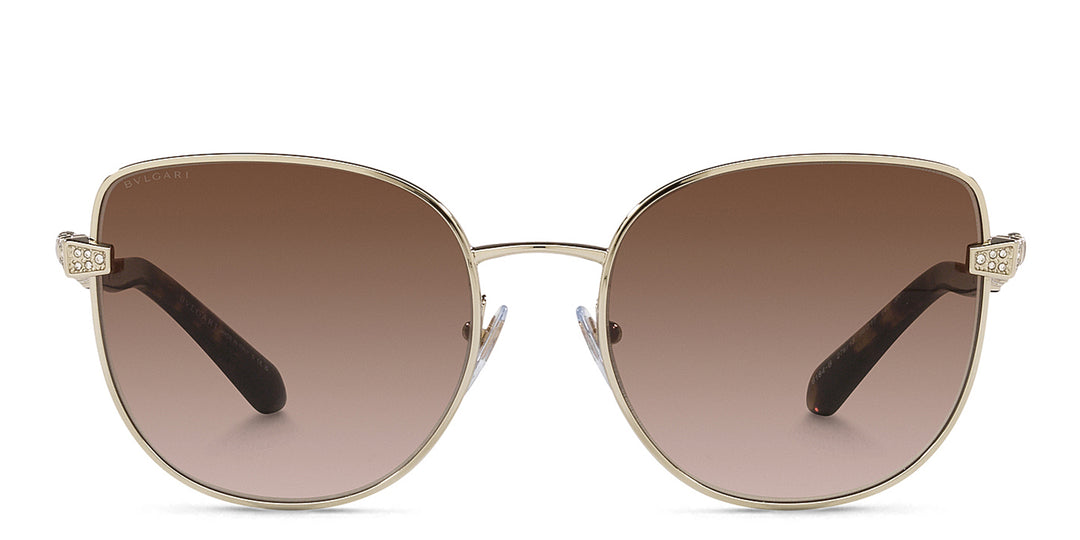 Cat-eye sunglasses, light gold frames with brown lenses and rhinestone bridge details
