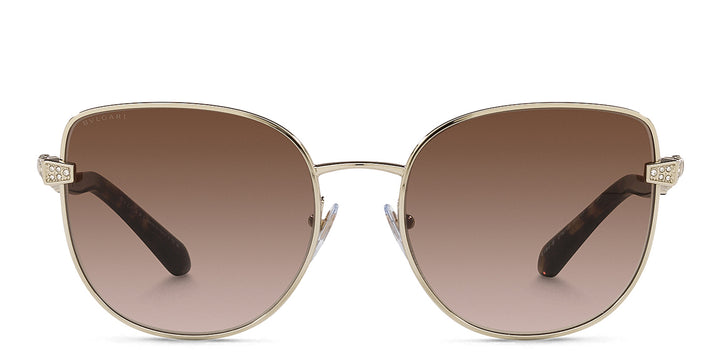 Cat-eye sunglasses, light gold frames with brown lenses and rhinestone bridge details