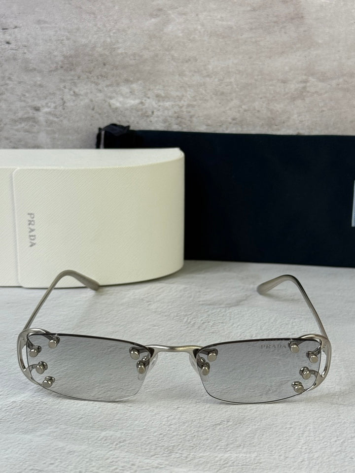 Prada PR C57S Rimless Sunglasses in Silver Grey