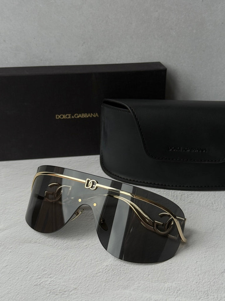 Dolce &amp; Gabbana DG2298B Gafas de sol con escudo negro cristalino 
