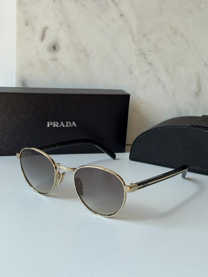 Prada PR B52S Sunglasses in Gold Grey