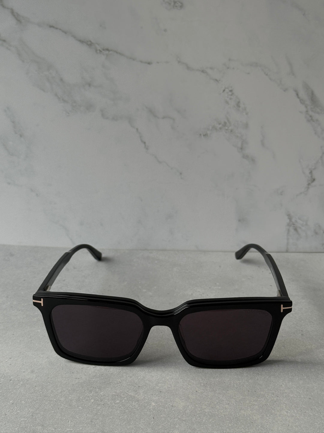 Black rectangular sunglasses, front view with dark tinted lenses