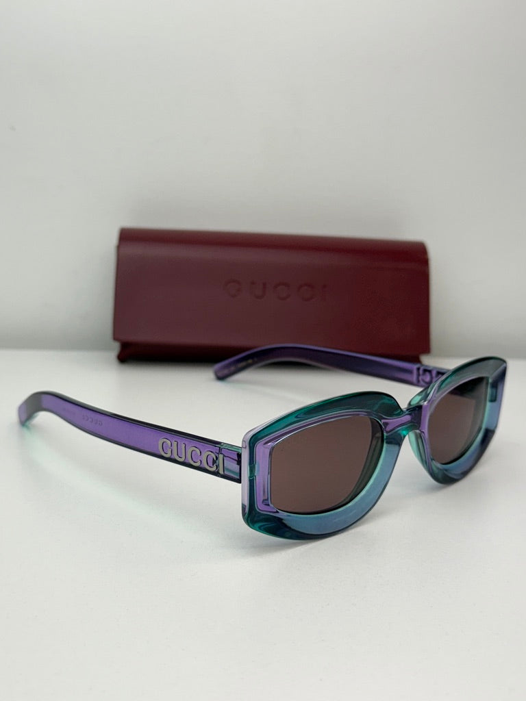 Gucci GG1719S Oval Sunglasses in Transparent Violet