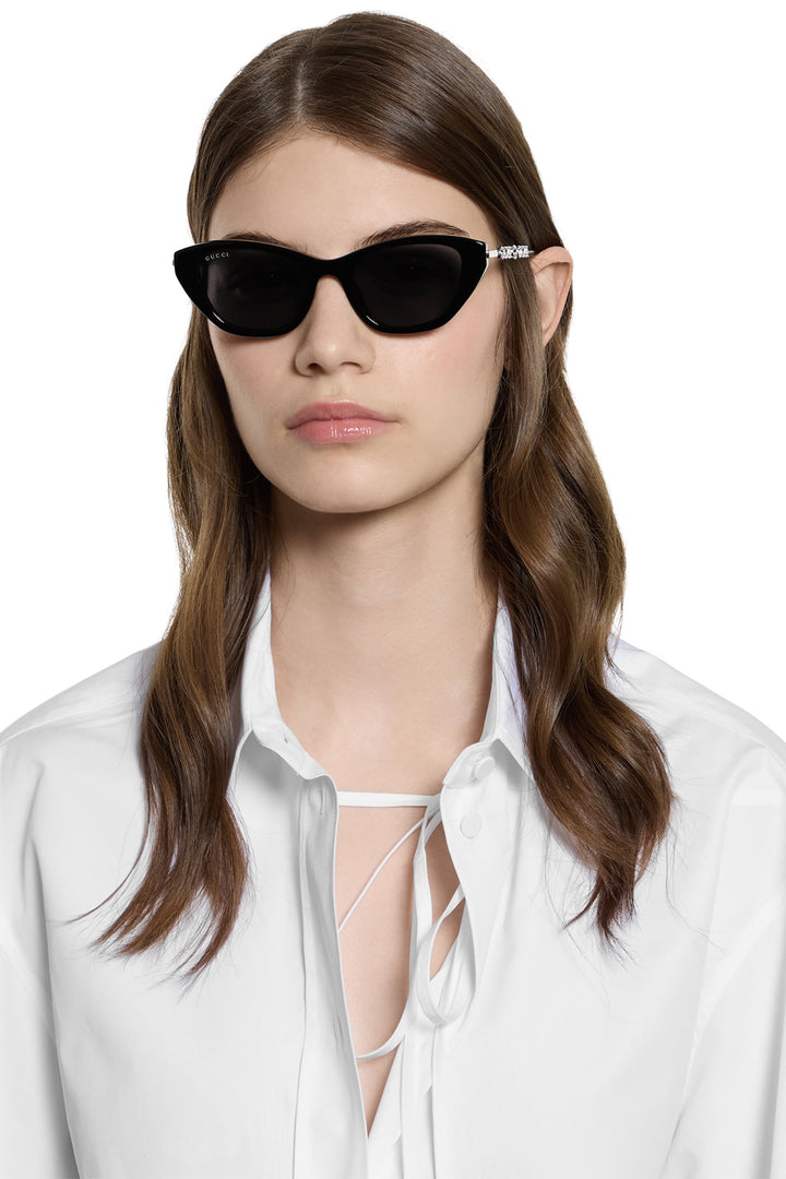 Gucci GG1257S Gafas de sol redondeadas con lentes marrones y rojos