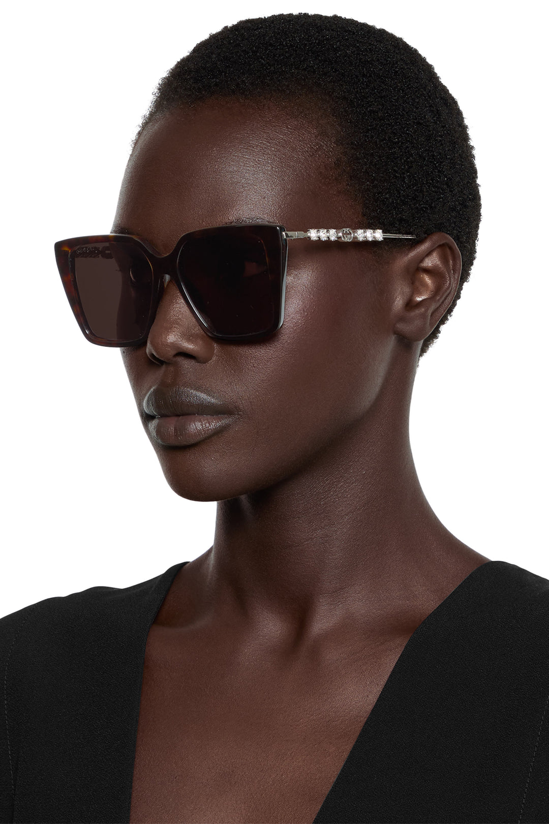 Gucci GG1257S Gafas de sol redondeadas con lentes marrones y rojos