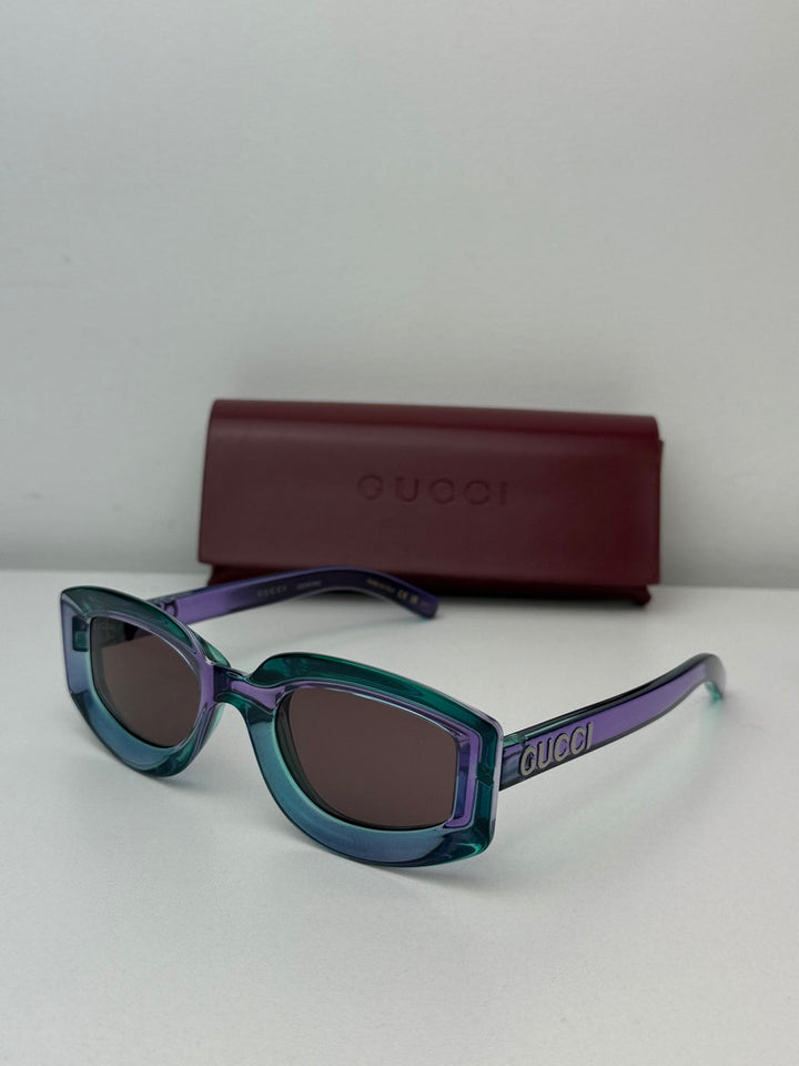 Gucci GG1719S Oval Sunglasses in Transparent Violet