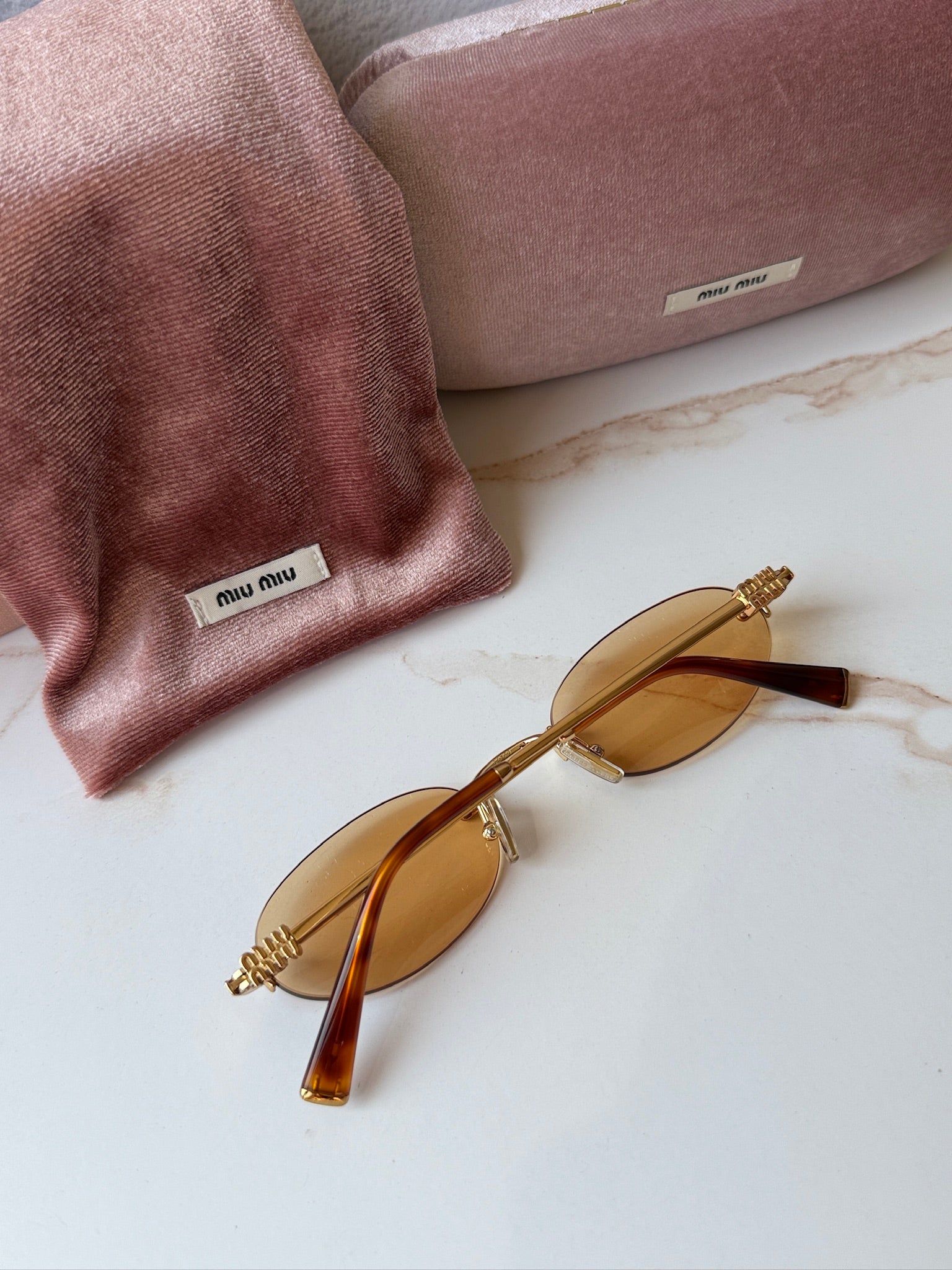 Miu Miu MU A54S Brass Orange Oval Rimless | Designer Daydream