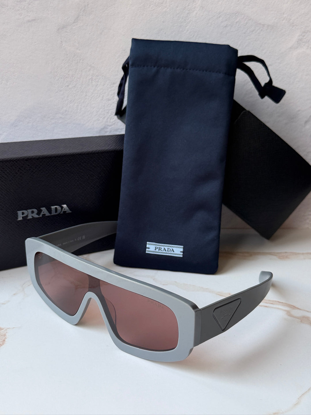 Prada PR D10S Sunglasses in Grey