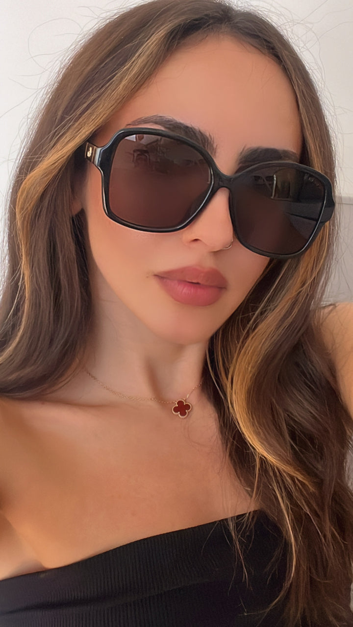 Gafas de sol negras con mariposa y logo Marmont de Gucci GG0765SA