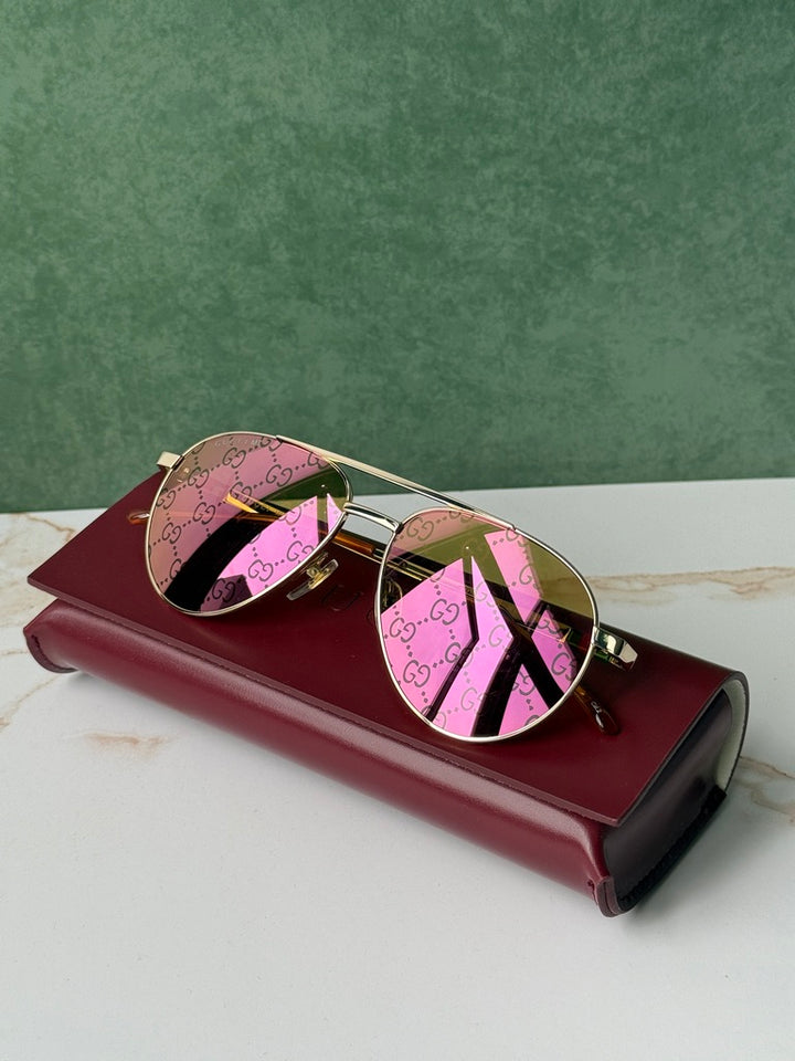 Gucci GG1220S Gafas de sol de aviador con monograma verde