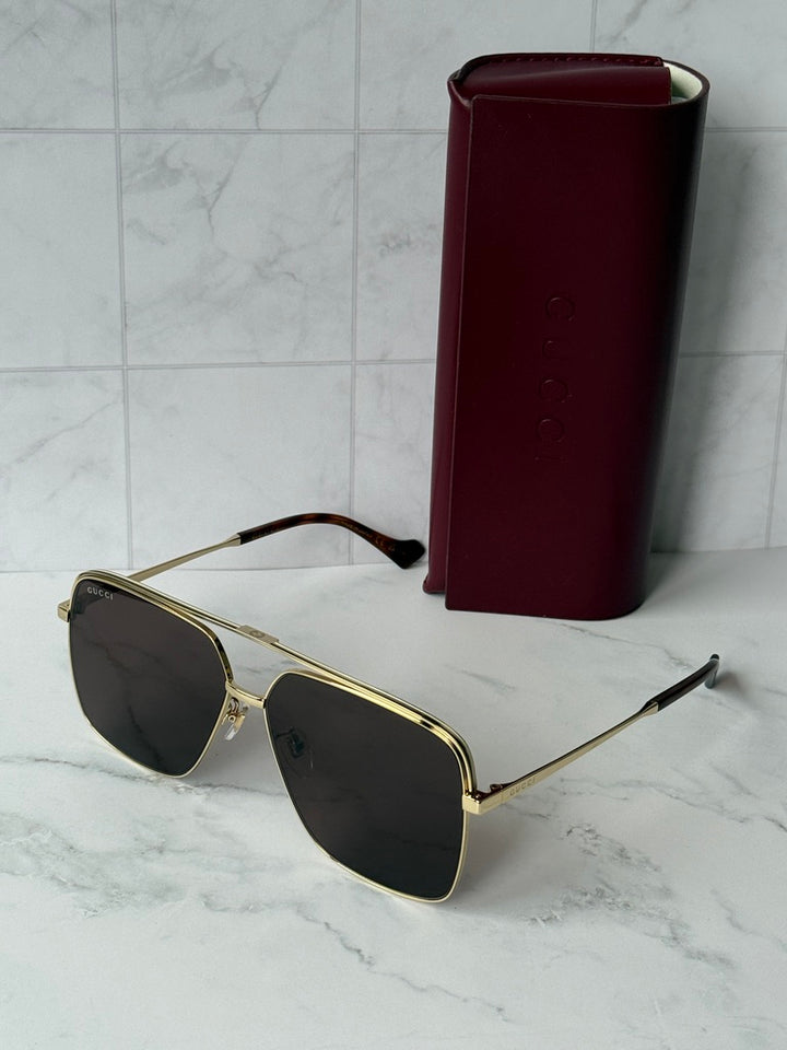 Gafas de sol piloto extragrandes Gucci GG1099SA Navigator con lentes marrones