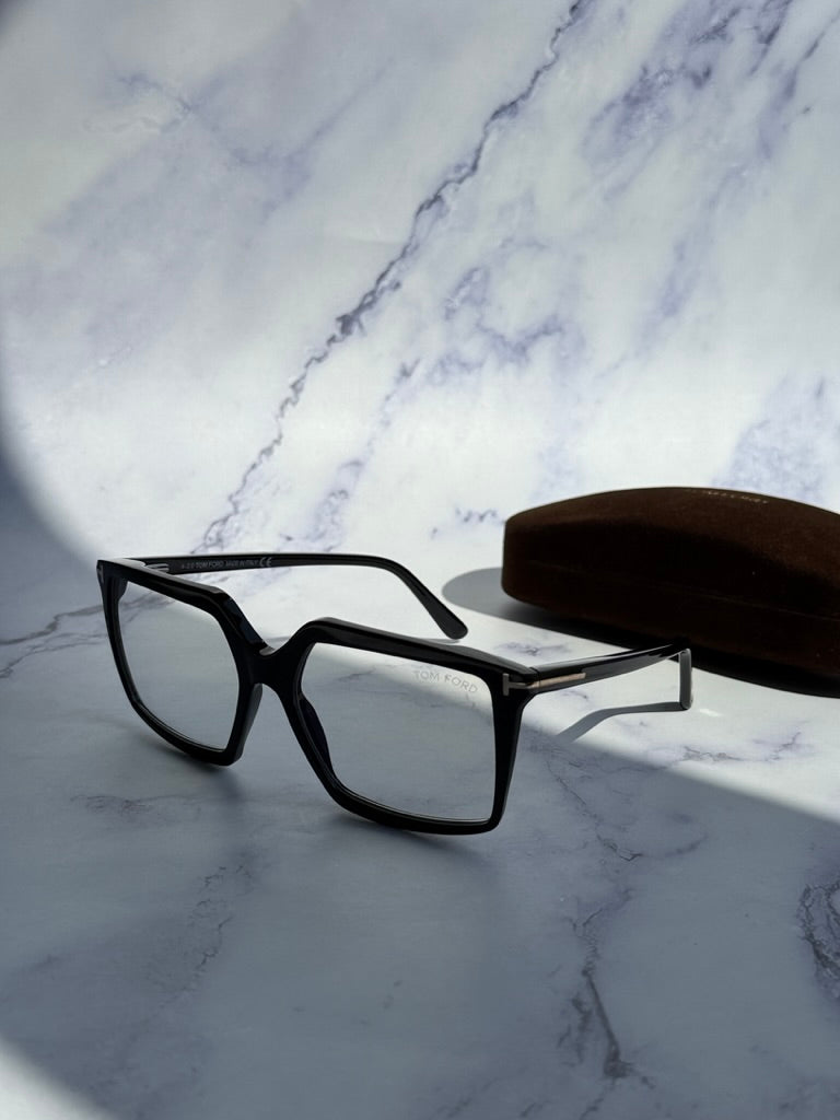 Tom Ford black clip-on sunglasses, side view with rectangular frame and temple arm