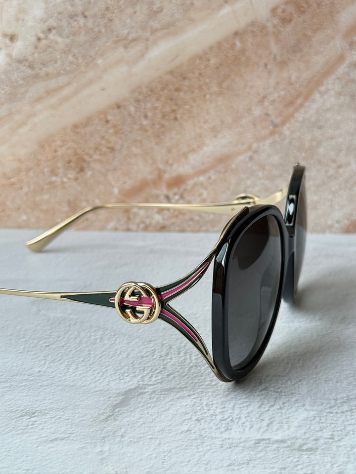 Gafas de sol con corte ovalado Gucci GG0226SK en negro rosa
