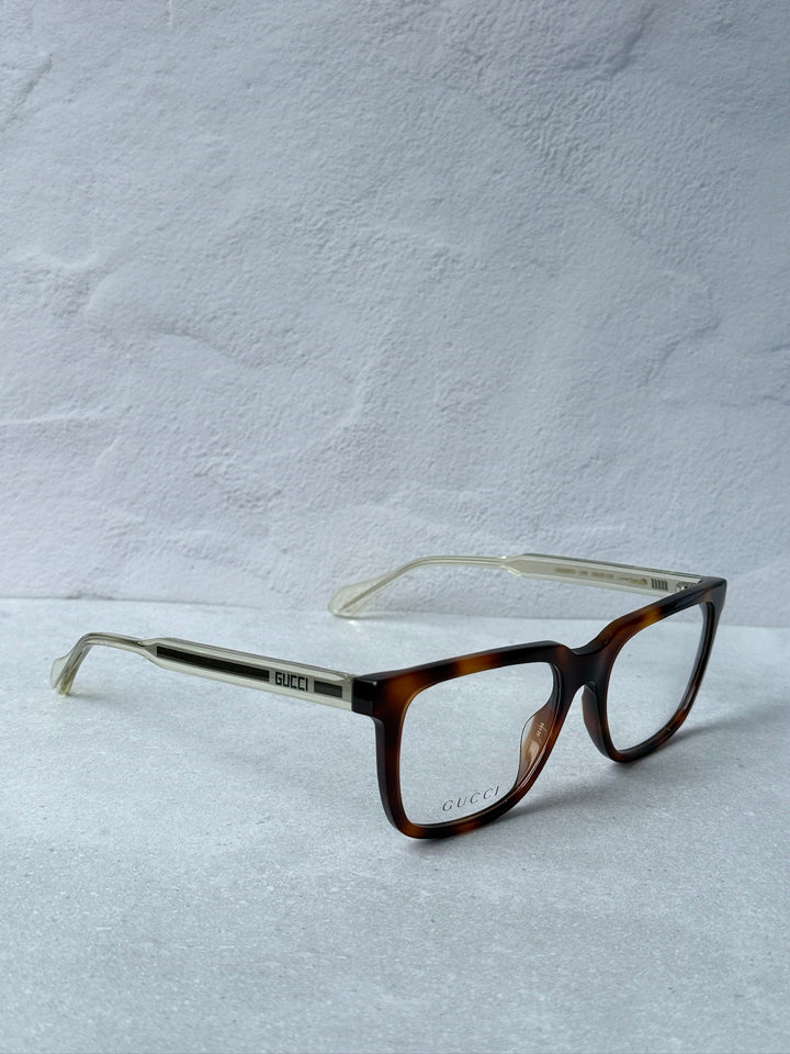 Monturas de anteojos rectangulares atrevidas Gucci GG0560O en negro