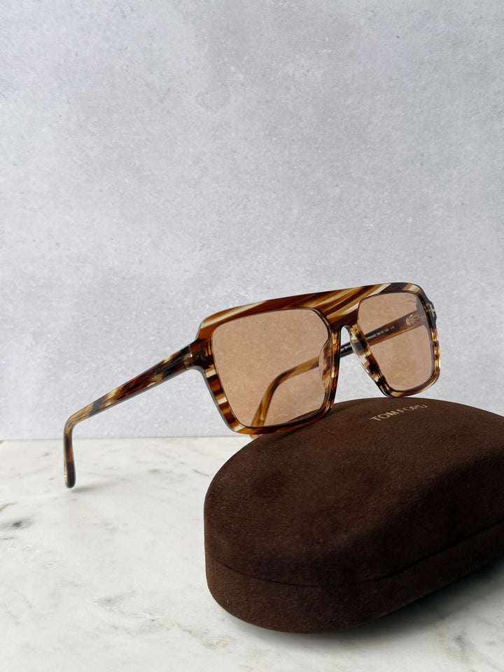 Aviator sunglasses with brown tinted lenses and tortoise-shell frame