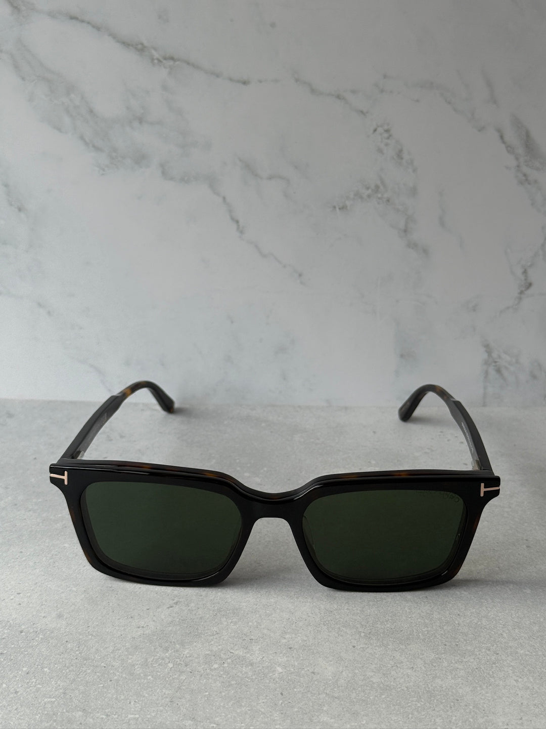 Rectangular black/dark sunglasses with dark green lenses and metal temple details