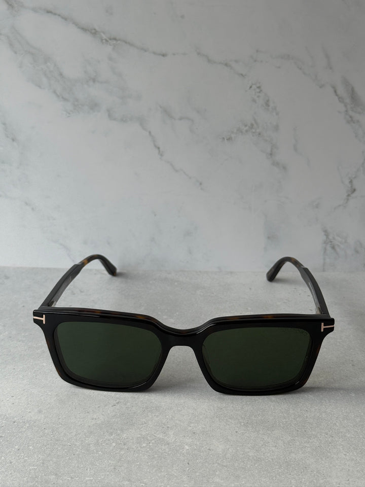 Rectangular black/dark sunglasses with dark green lenses and metal temple details