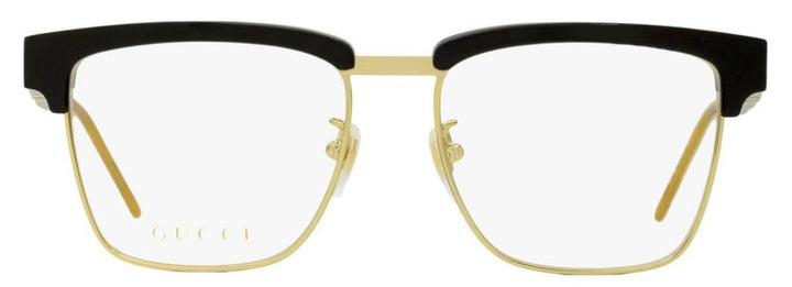 Close-up of square eyeglass frames, black front with gold-tone bridge and Gucci temples.
