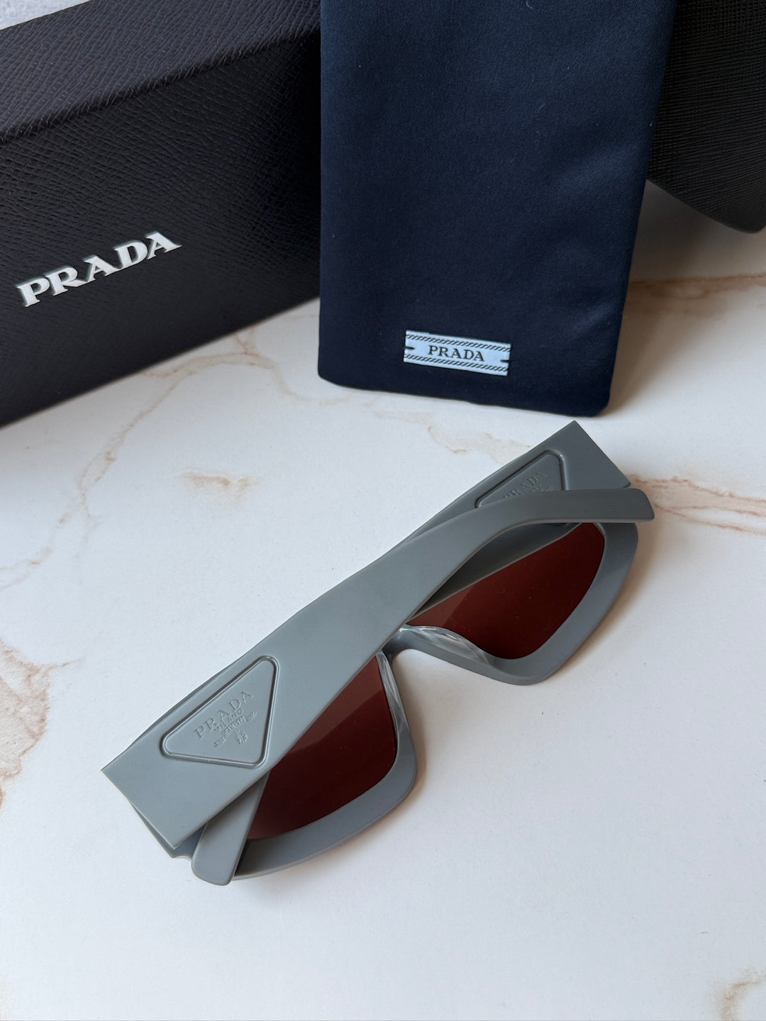 Prada PR D10S Sunglasses in Grey