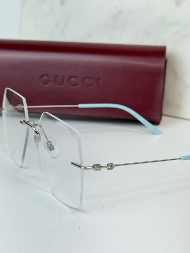 Monturas de anteojos sin montura hexagonales de gran tamaño Gucci GG0683O